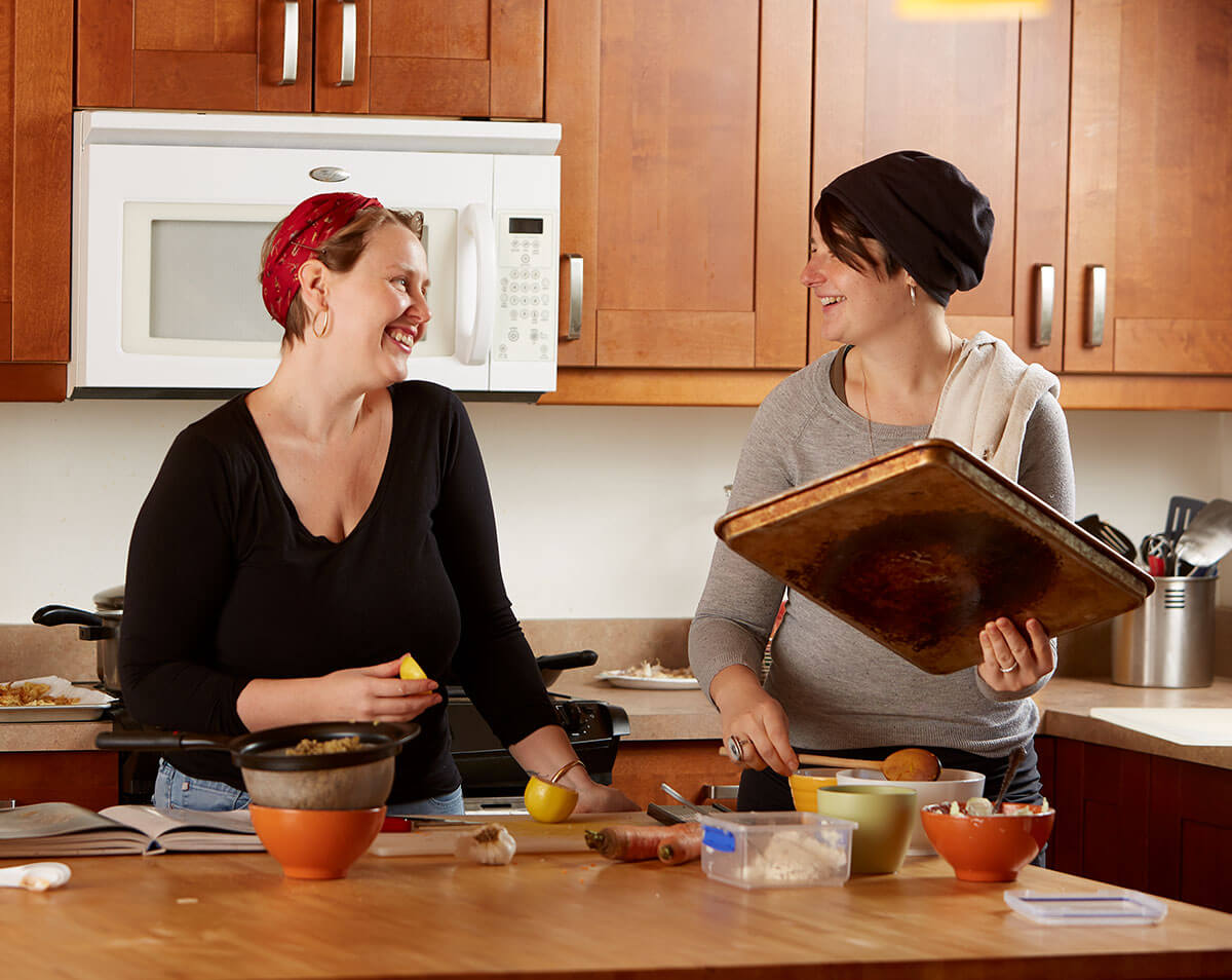 about-pic Founders Molly and Maddy in the kitchen