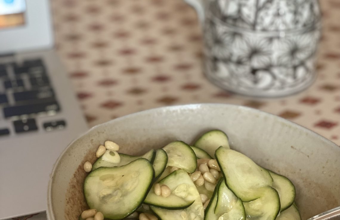 Sliced zucchini salad with fork