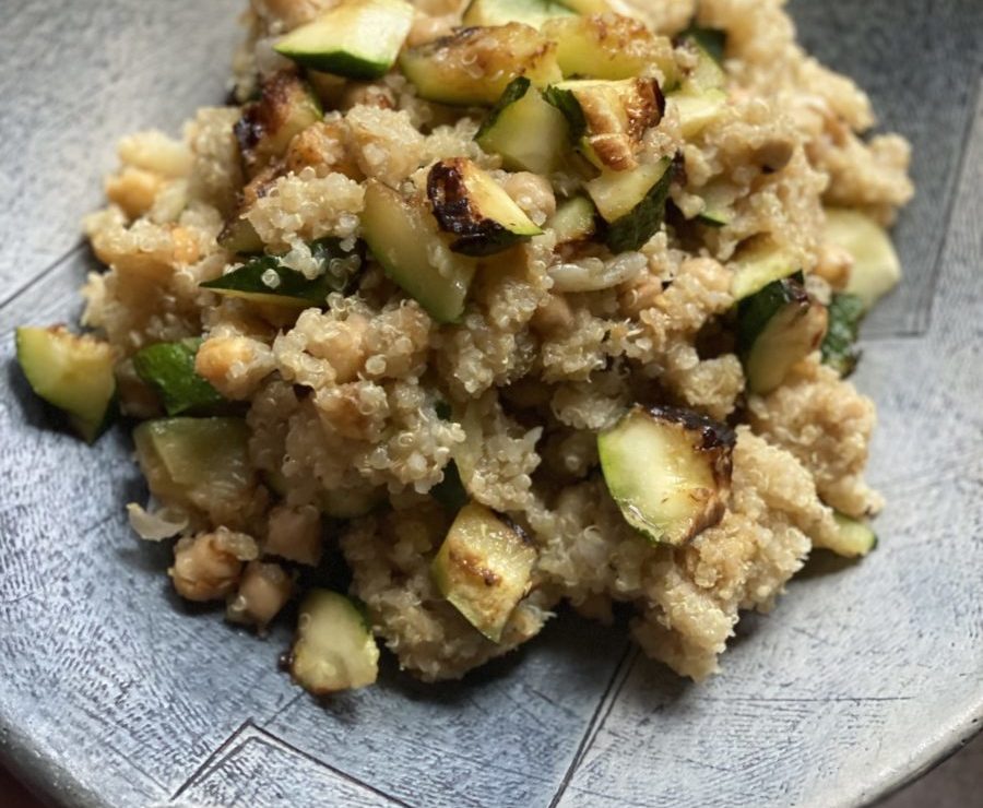 ceramic bowl with quinoa zucchini chickpea salad